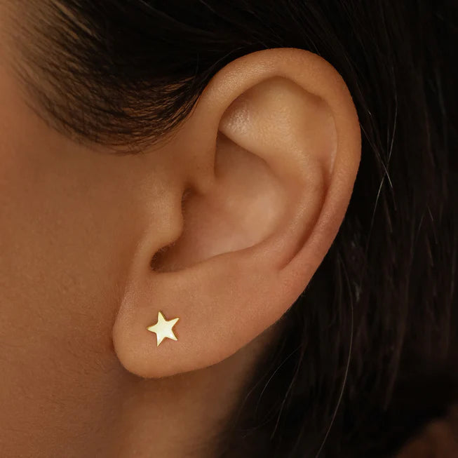 Small gold star on sale stud earrings