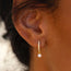 Daniella Diamonds Hoops Earrings with one dangling diamond - Pair