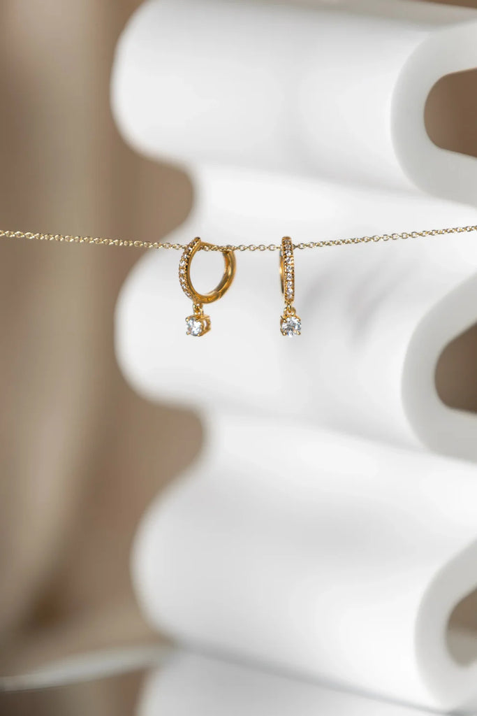 Daniella Diamonds Hoops Earrings with one dangling diamond - Pair
