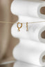 Daniella Diamonds Hoops Earrings with one dangling diamond - Pair