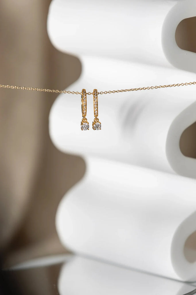 Daniella Diamonds Hoops Earrings with one dangling diamond - Pair